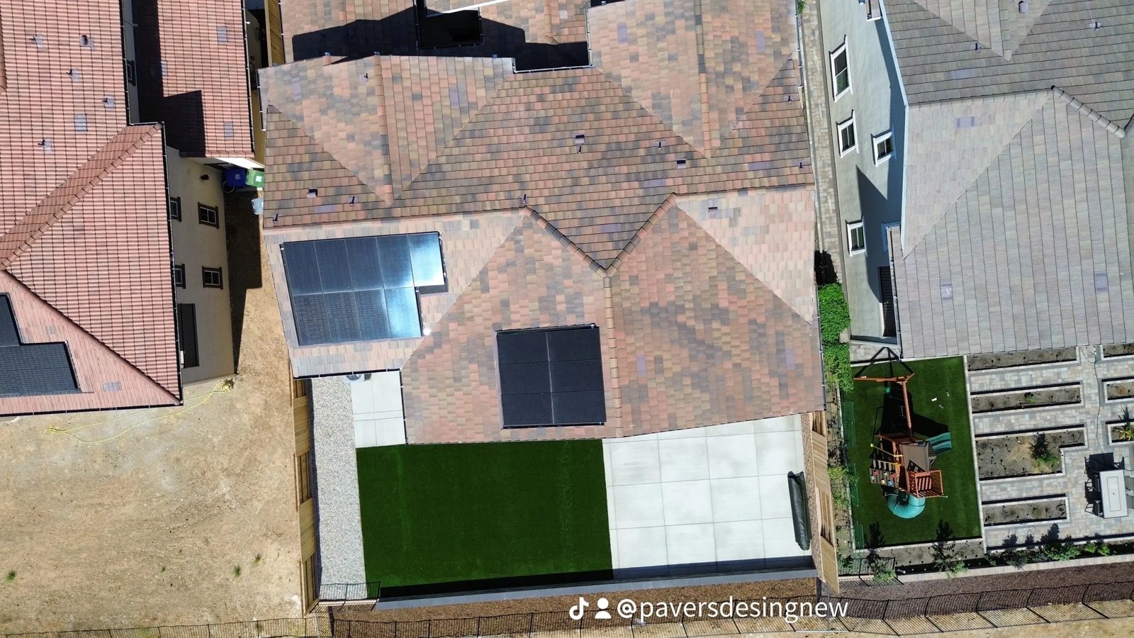 An aerial perspective reveals the relationship between the pool, patio and lawn.